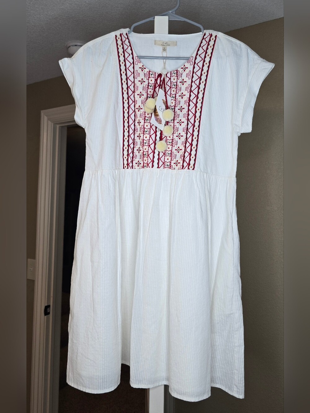 Chelsea & Violet White Dress with Red Embroidered Panel and Pom-Poms